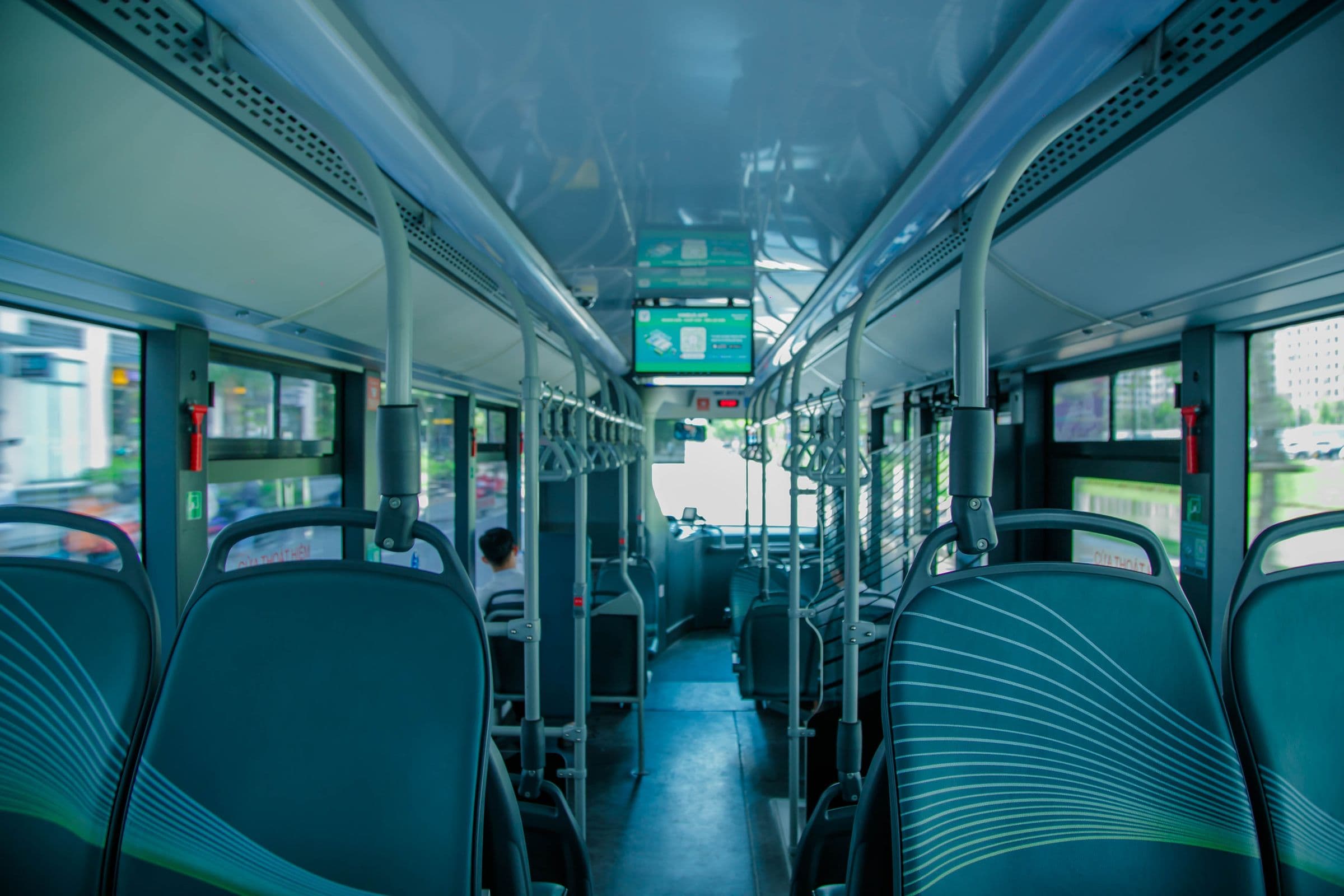 Inside a clean, modern Commuit shuttle during an Accra commute